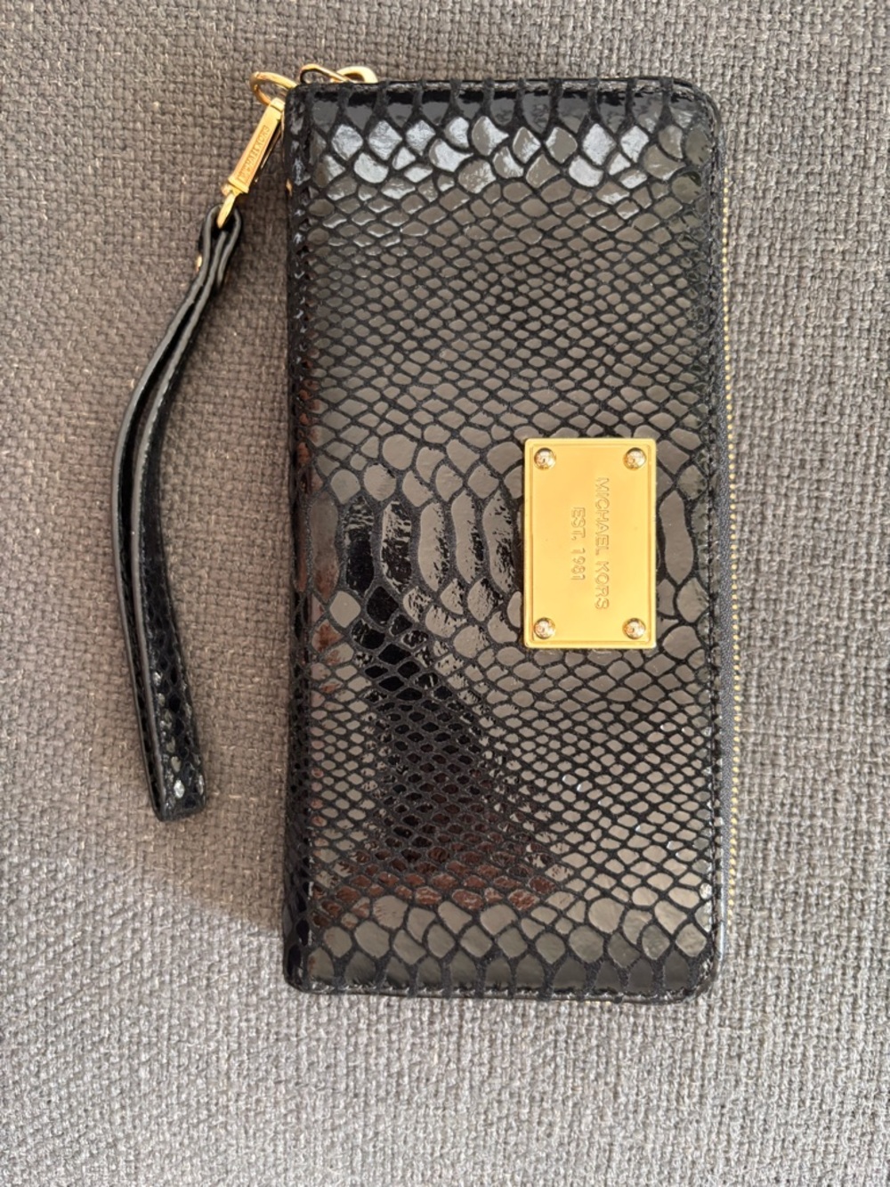 Michael Kors Black Snake-Embossed leather wallet w/wrist strap and gold hardware